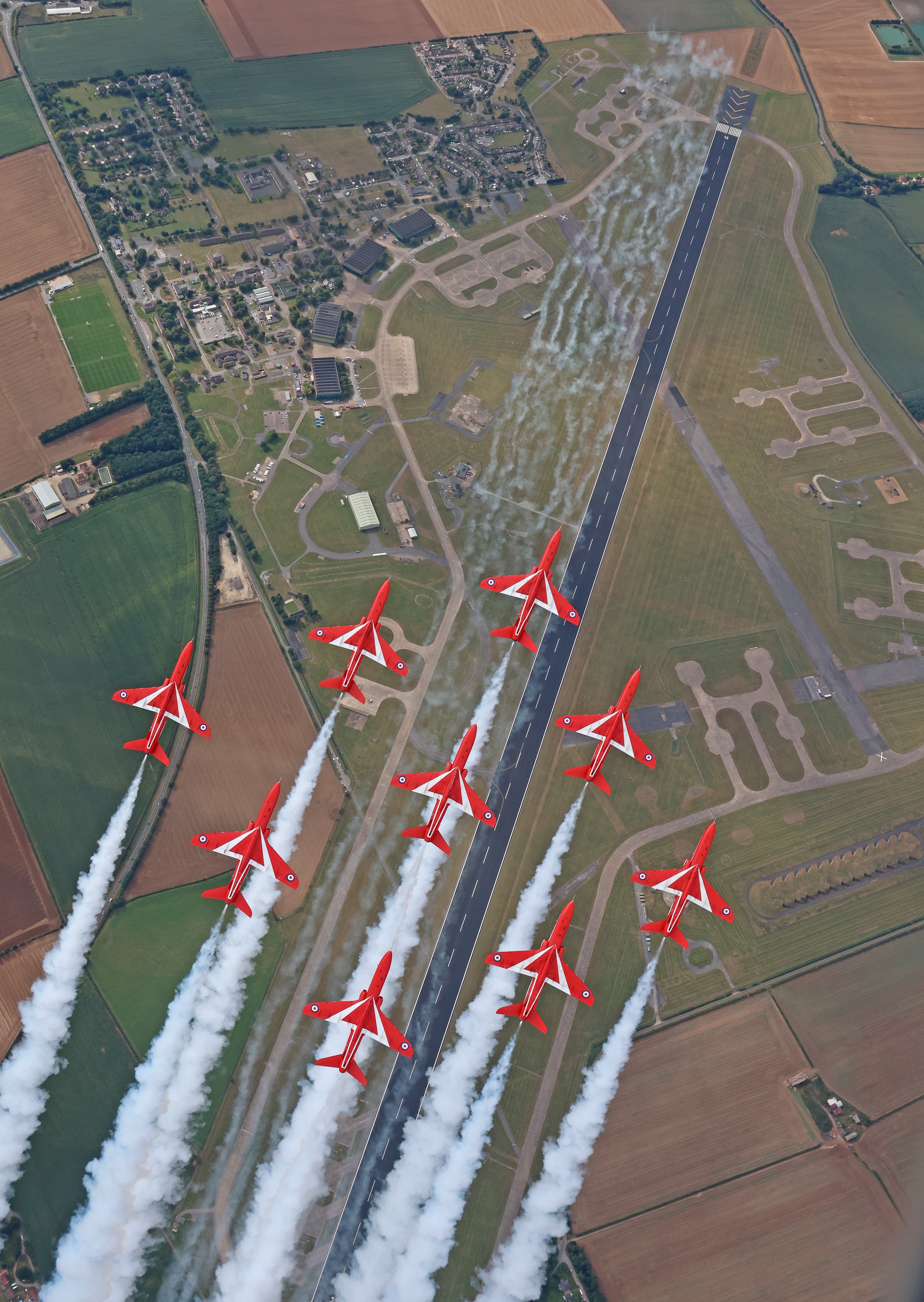 The Red Arrows returning to RAF Scampton in style after a display.